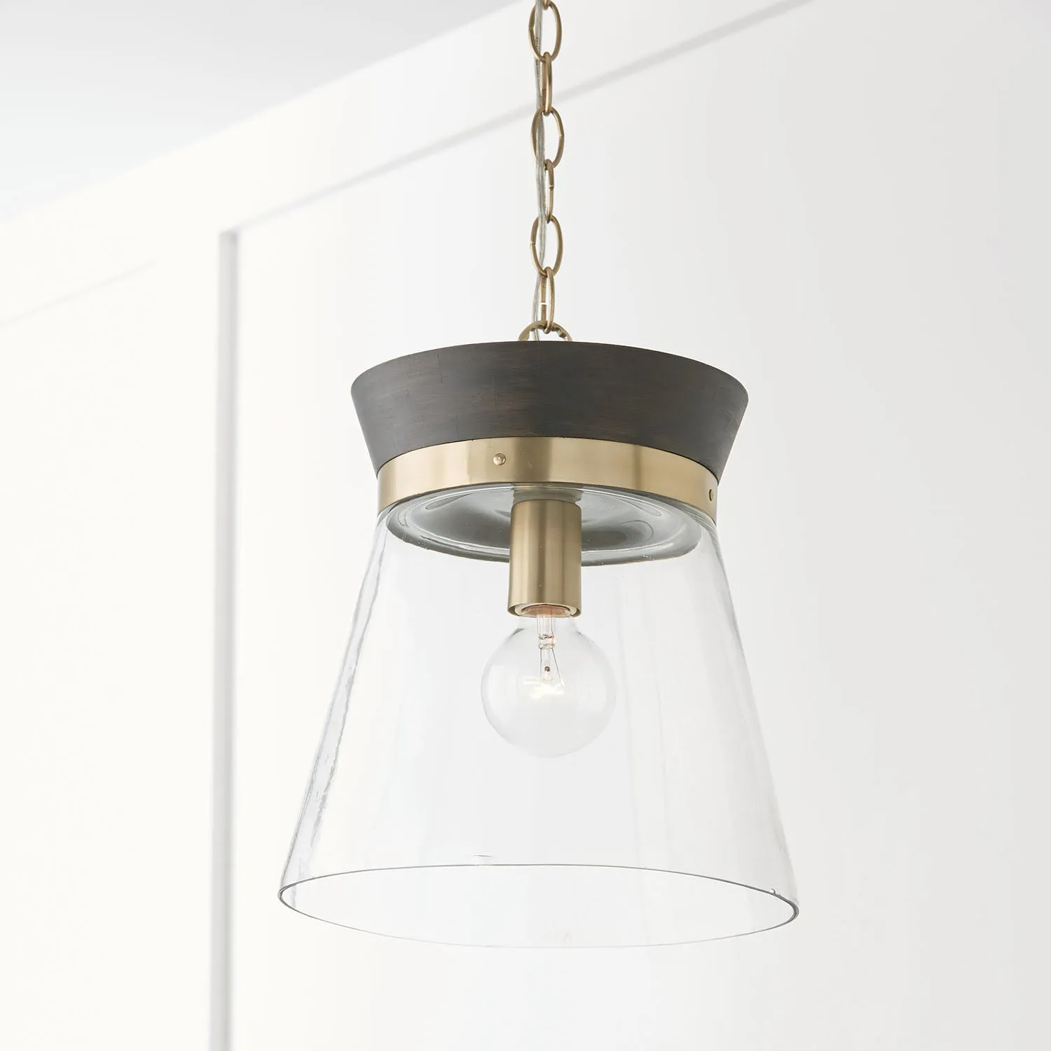 FINN 1-LIGHT PENDANT, BLACK STAIN AND MATTE BRASS