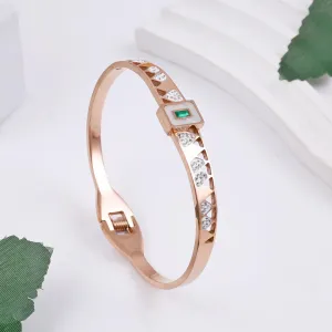 Rose Gold Plated Geometric Bracelet with Green Gemstone and Crystals".