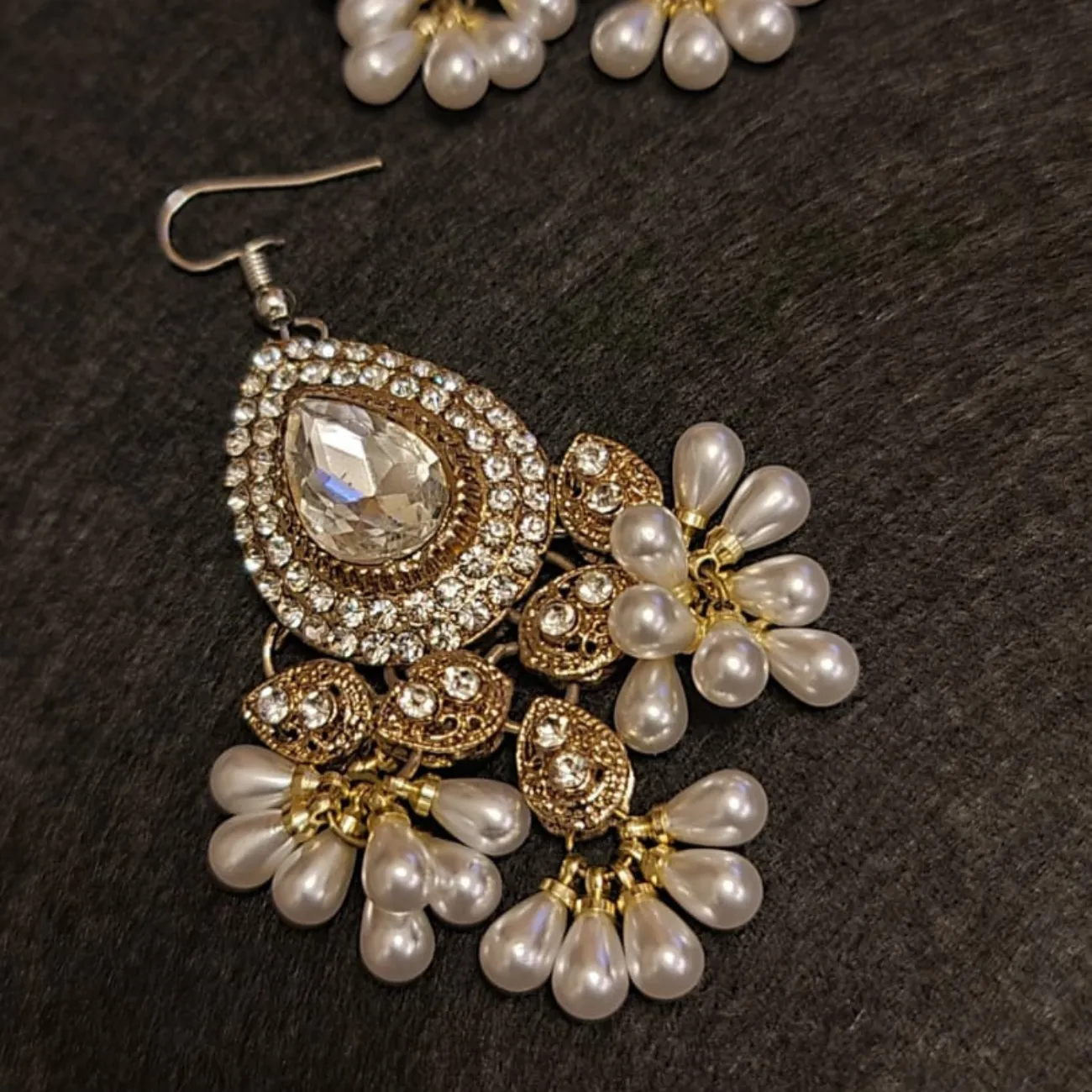 Traditional diamond cut stones and pearl  earrings, tikka set